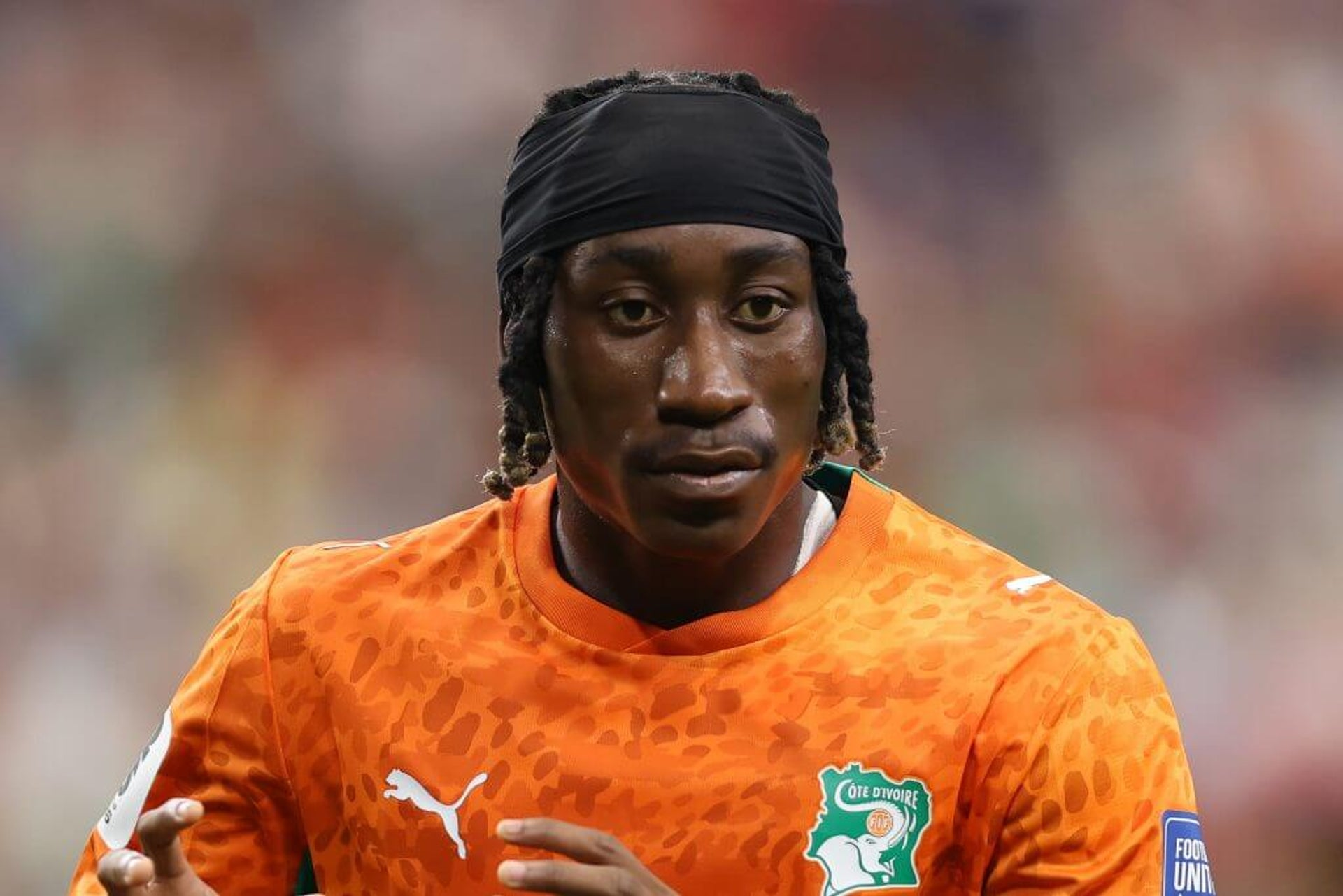 Image of Yan Diomane from the shoulders up playing for Ivory Coast