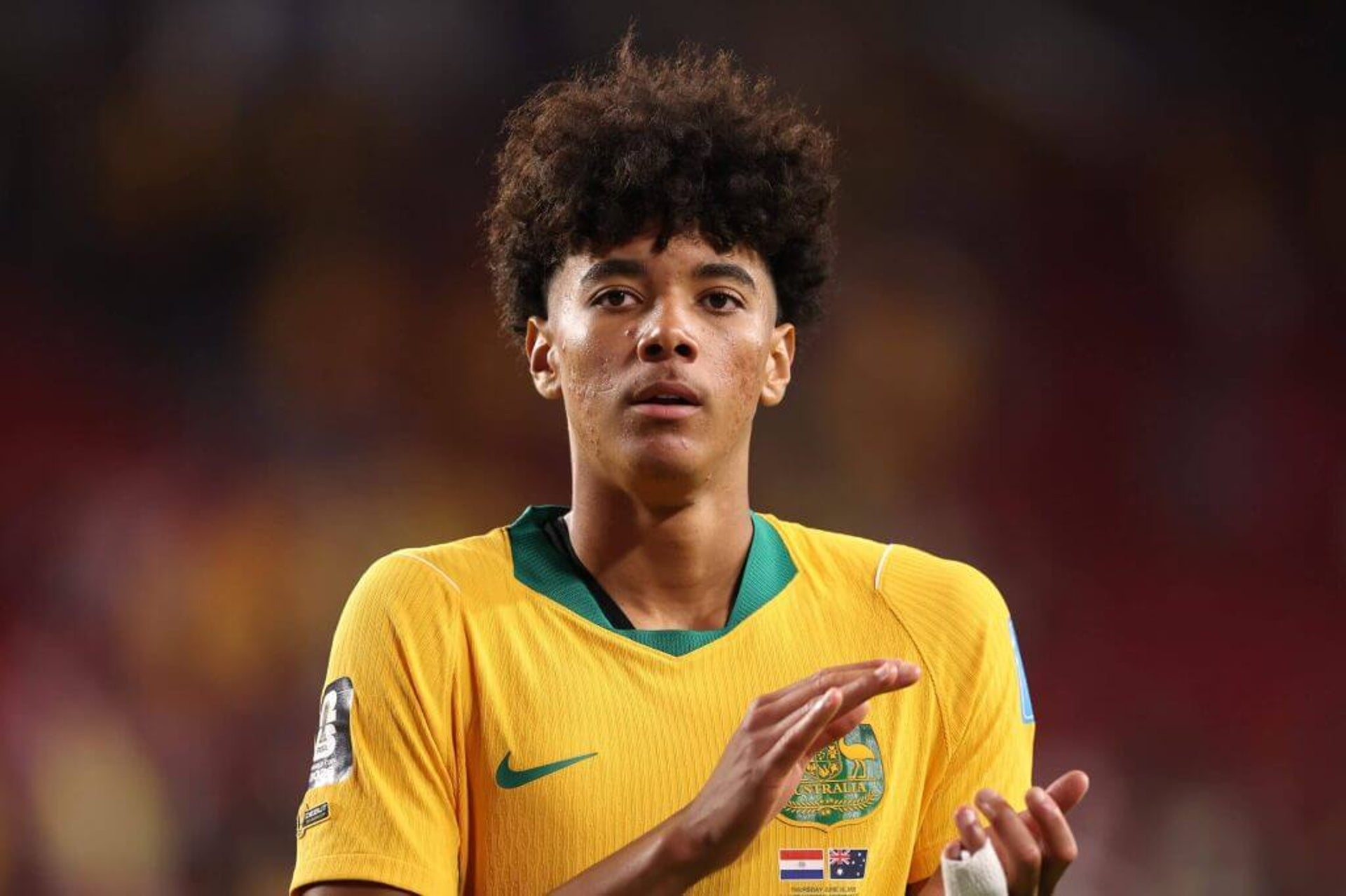 Australia defender Lucas Herrington applauds